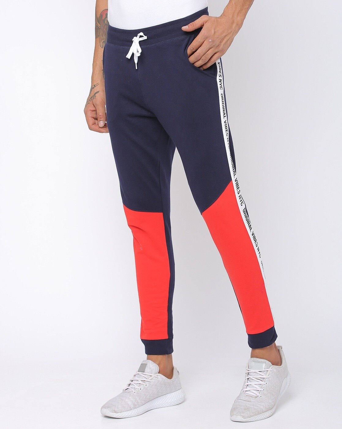 navy blue and red joggers