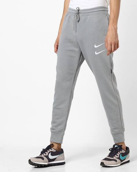 Buy Grey Track Pants for Men by NIKE 