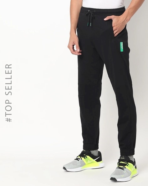Buy UNITED COLORS OF BENETTON Green Solid Cotton Lycra Slim Fit Mens  Trousers | Shoppers Stop