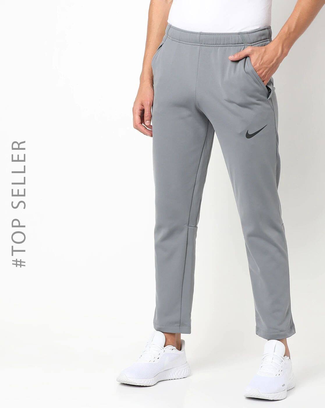 Buy Grey Track Pants for Men by NIKE 