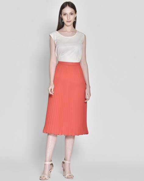 orange skirt combination