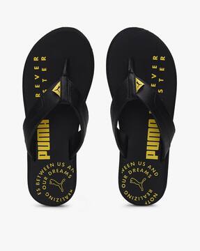 puma yellow flip flops