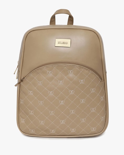 beige travel backpack