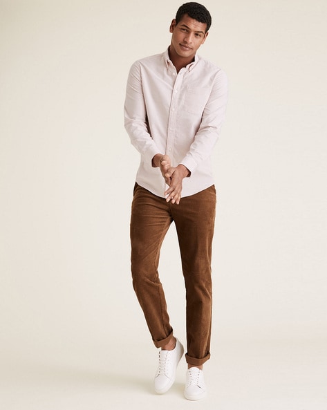 beige chinos pink shirt