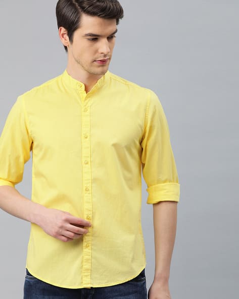 yellow collared shirt