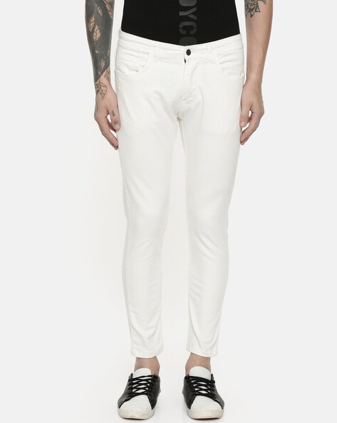 white accidental jeans