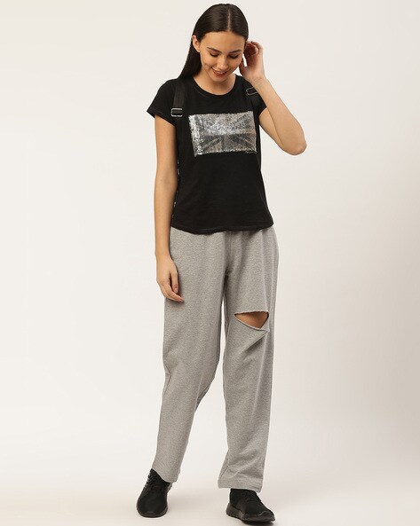 Torn best sale track pants