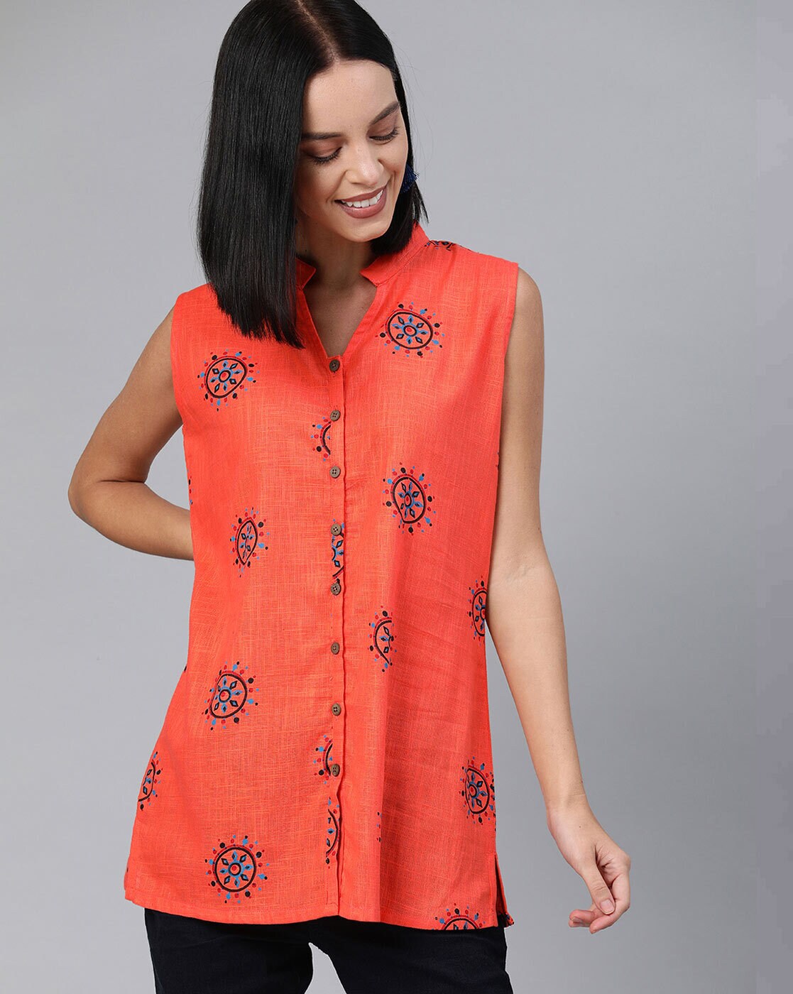 orange sleeveless tunic