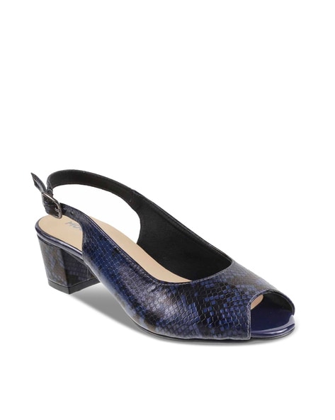 Slingback high heel pumps in navy blue leather . PURA LOPEZ