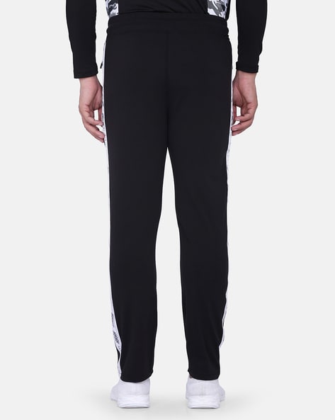 Buy OFF LIMITS Men Black Solid Slim Fit Gym Track Pants - Track Pants for  Men 10804442 | Myntra