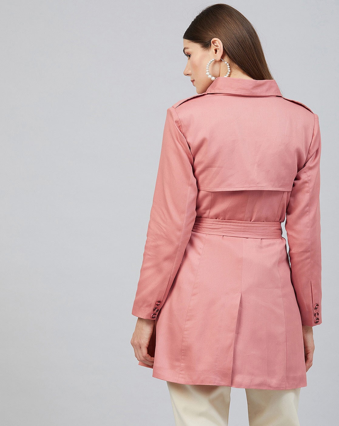 pink belted trench coat