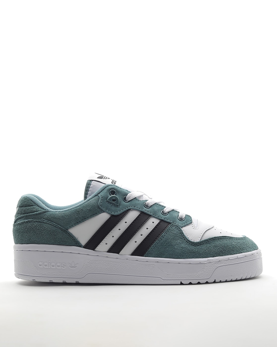 Adidas sneakers hotsell with green stripes