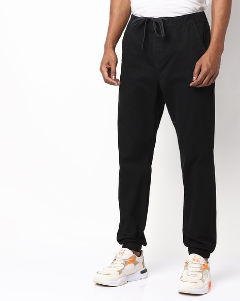 Buy Black Trousers & Pants for Men by DENIZEN FROM LEVIS Online 