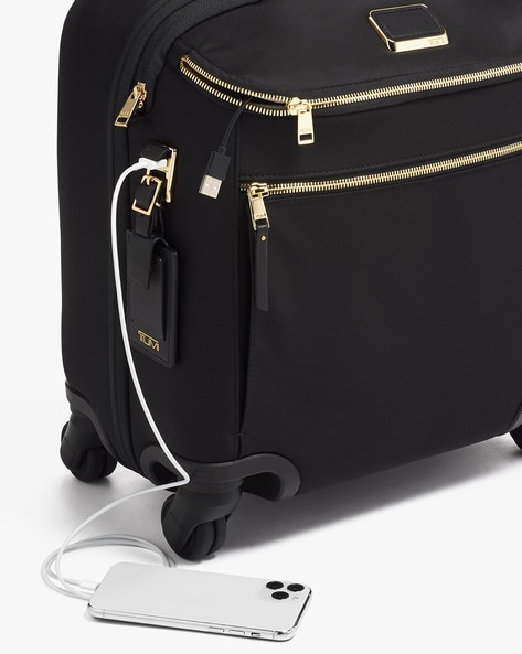 Tumi black and outlet gold luggage