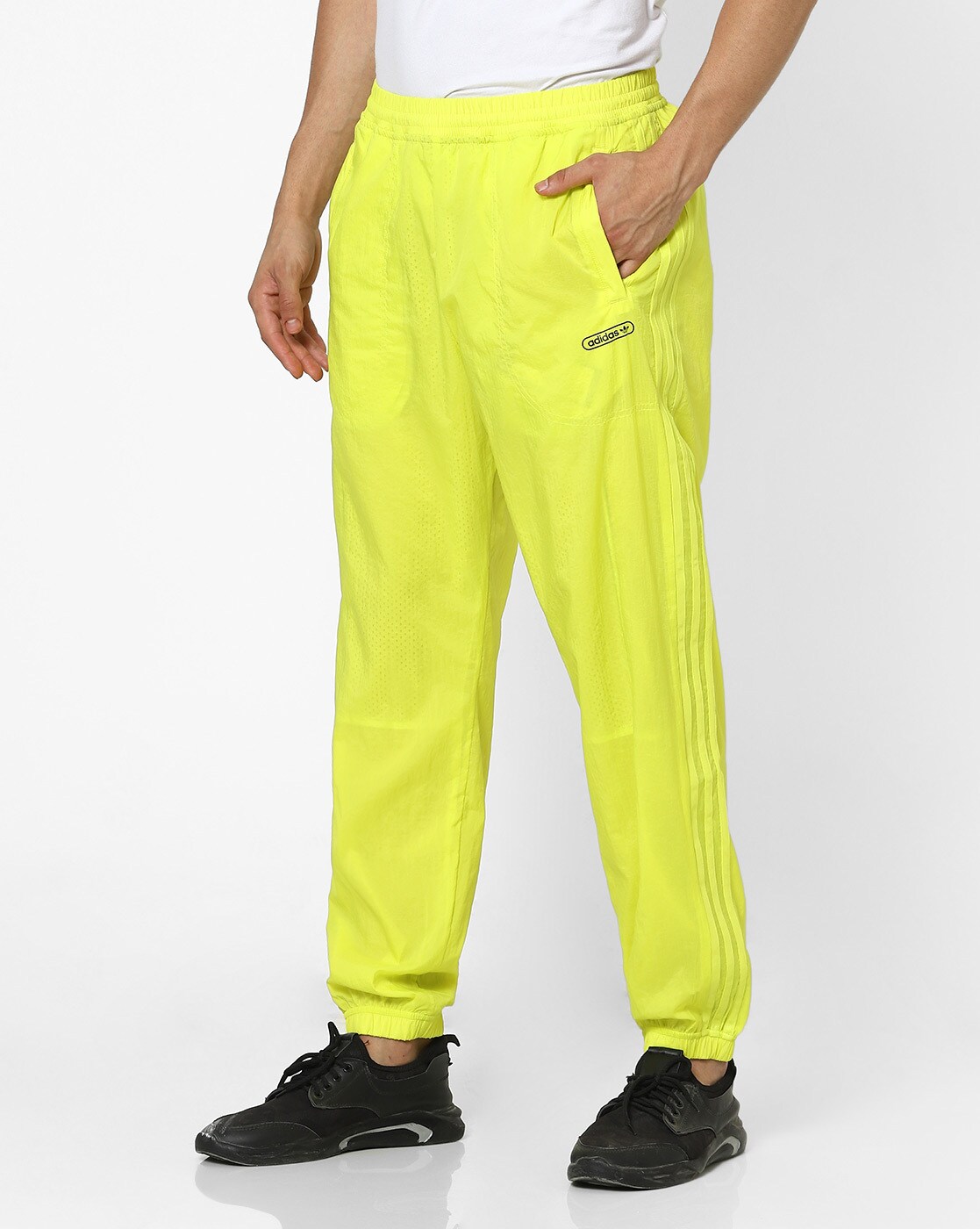 Yellow Denali fleece and shell track pants | The North Face | MATCHES UK