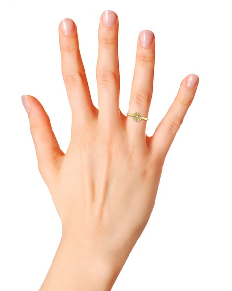 Vertical View Of A Golden Ring On A Womans Little Finger On A Bright Soft  Background Stock Photo - Download Image Now - iStock