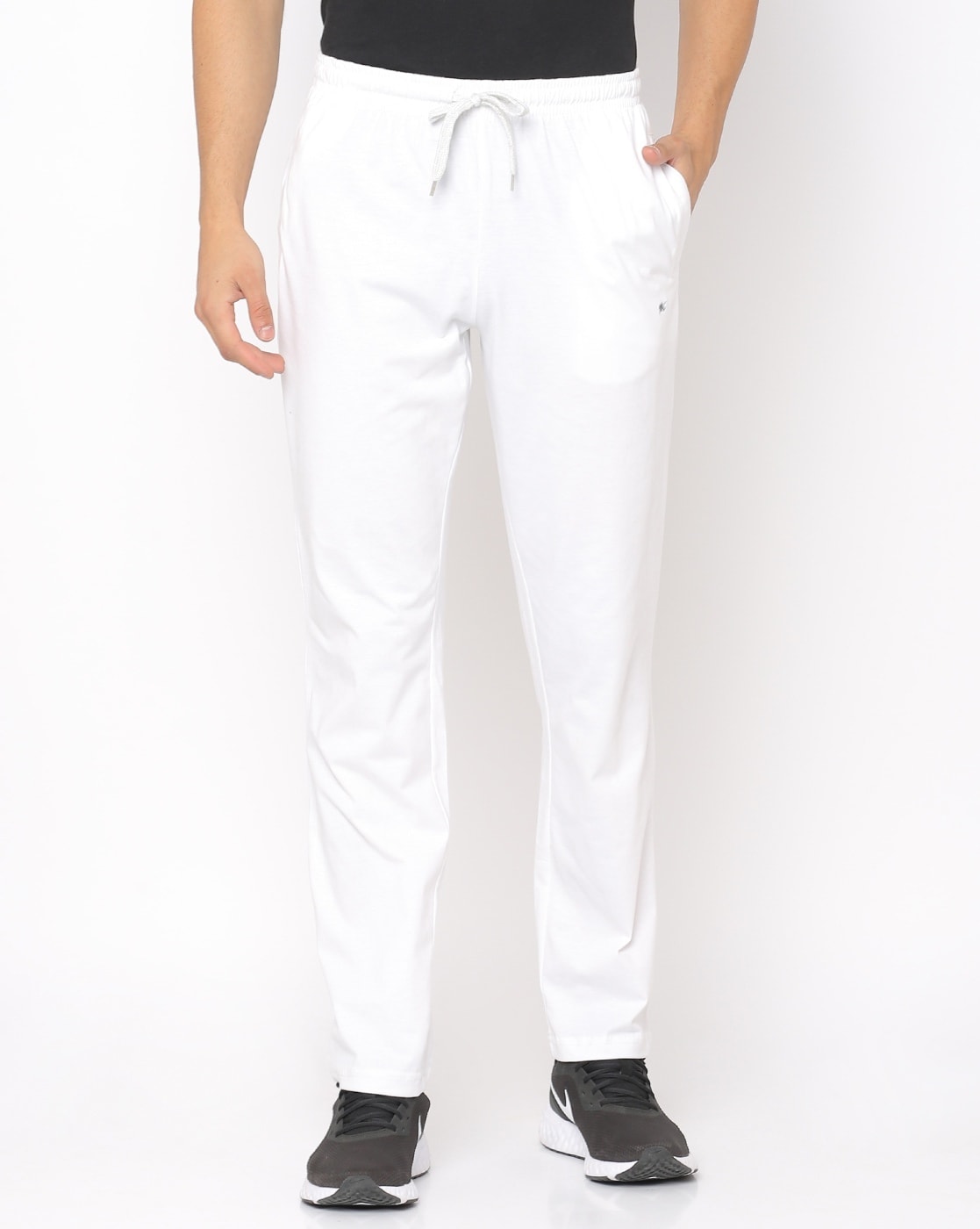Buy Men White Solid Slim Fit Casual Track Pants Online - 654193 | Van Heusen