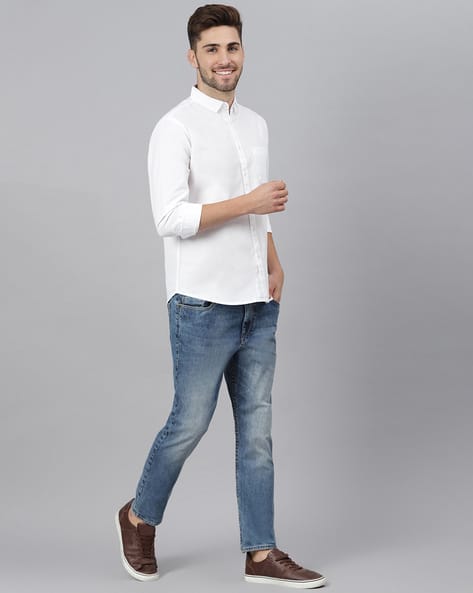 white dress shirt and jeans