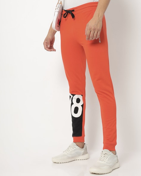 Mens orange best sale track pants