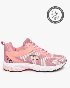 white and pink champion shoes