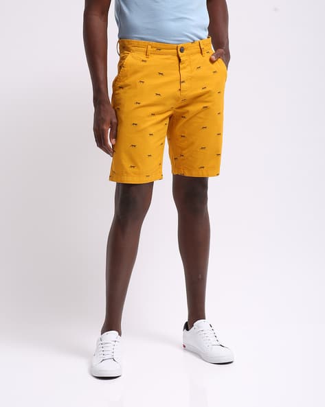mustard colored shorts