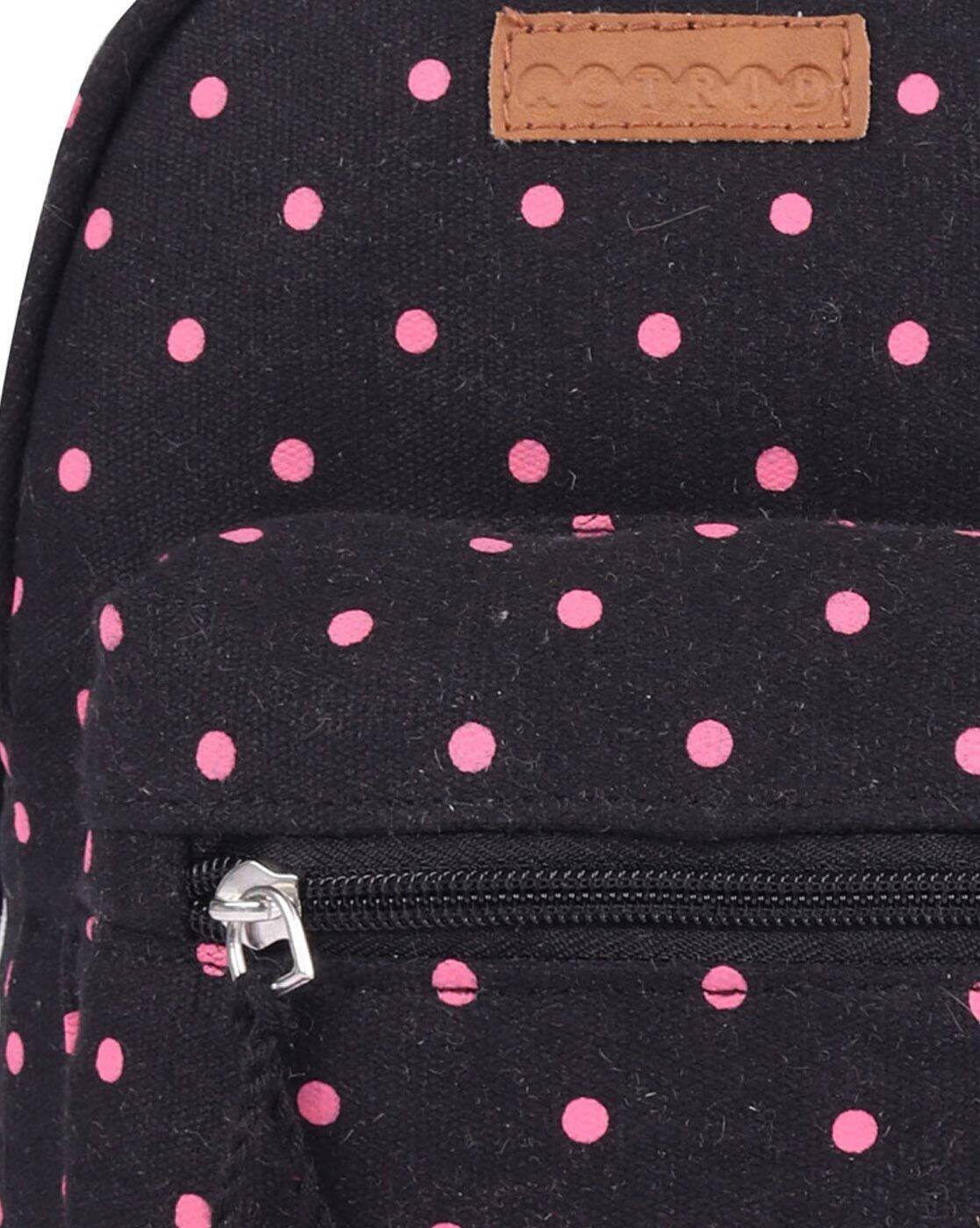 black polka dot backpack