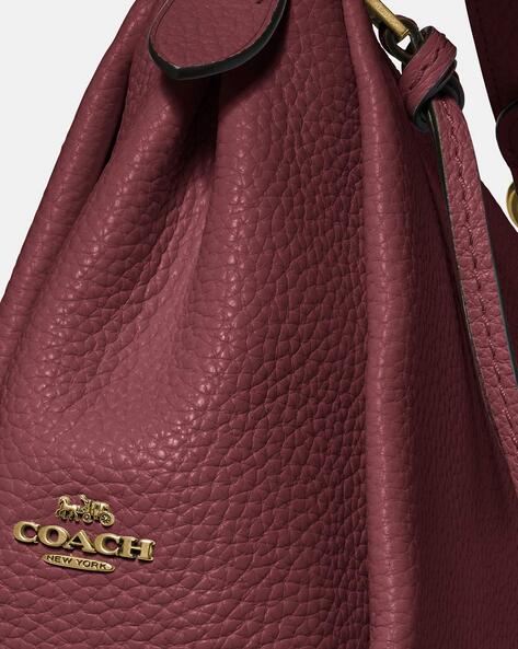 Coach wine colored on sale bag