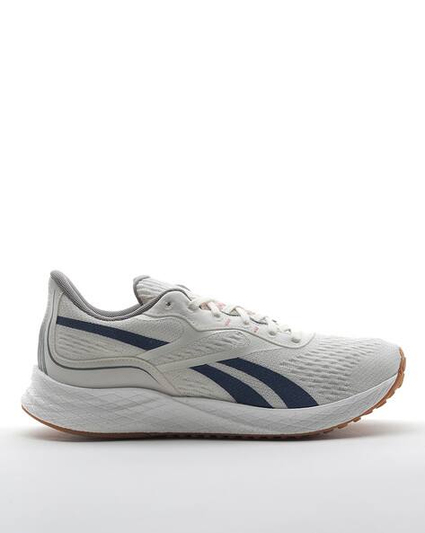 Buy White Sports Shoes for Women by 