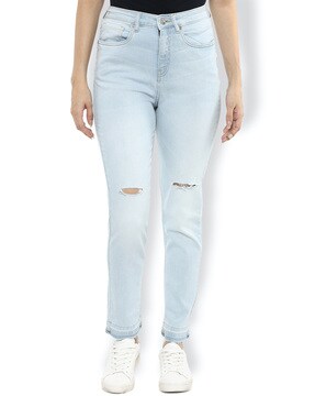 light wash skinny ripped jeans