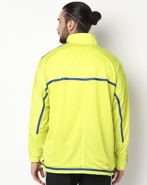 Adidas originals woven outlet jacket yellow