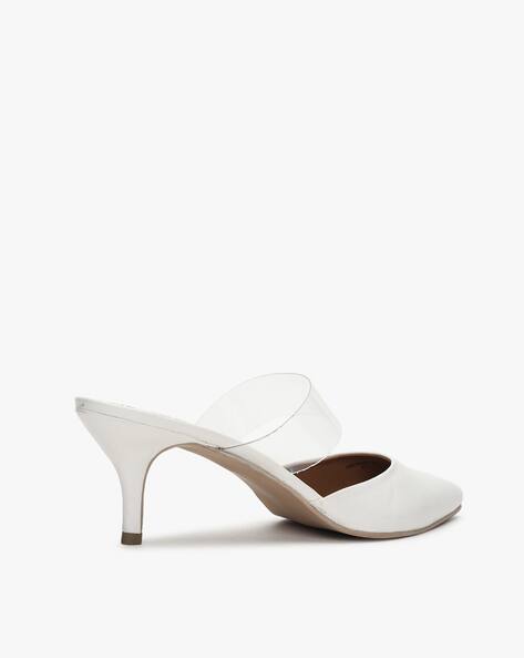 white pointed kitten heels