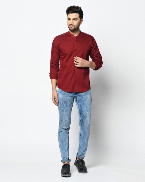 maroon shirt light blue jeans