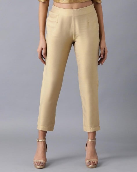 Women Light Gold Solid Pants Price in India