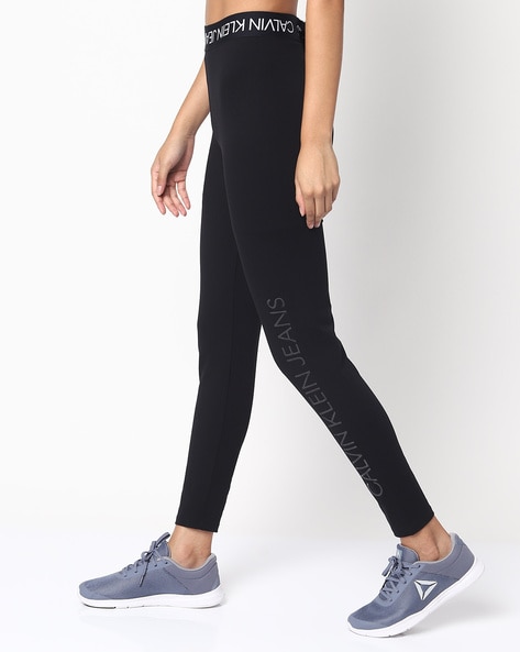 Calvin Klein Women's Signed Elastic Waistband High Waisted Flexible Fabric  Ease of Movement Black Leggings - Trendyol