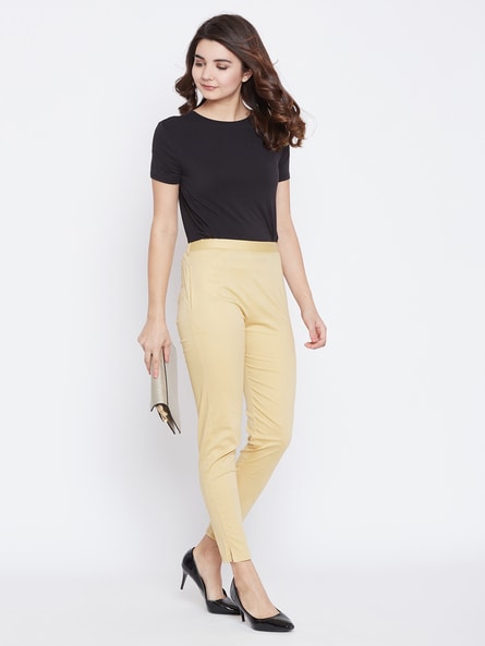 Buy Go Colors Women Cream Coloured Tapered Fit Solid Cropped Peg Trousers -  Trousers for Women 8756545 | Myntra