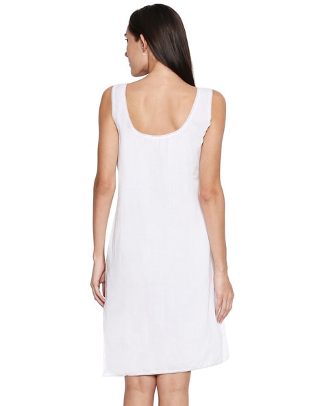 white sleeveless slip dress