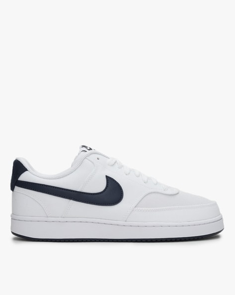 Nike men's hot sale white canvas shoes