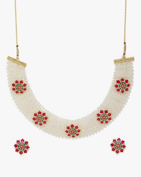 Women by ZAVERI PEARLS 