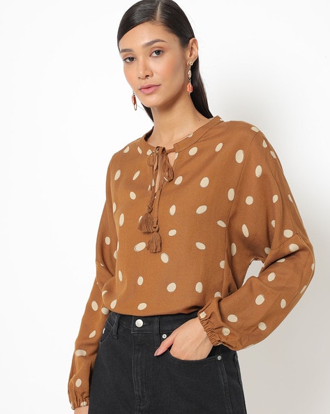 brown spotted blouse