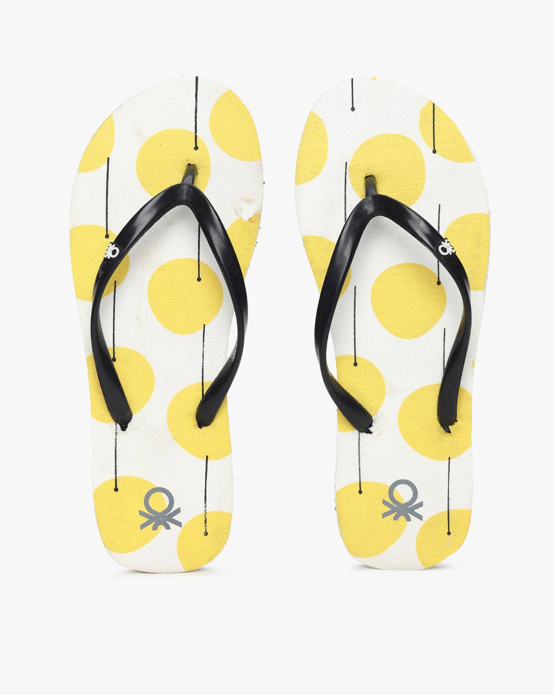 yellow dot flip flops