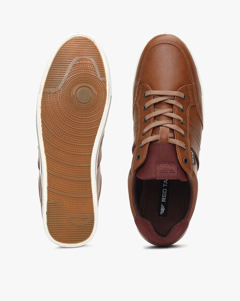 Red tape sales tan sneakers