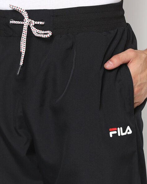 FILA Solid Men Black Track Pants - Buy FILA Solid Men Black Track