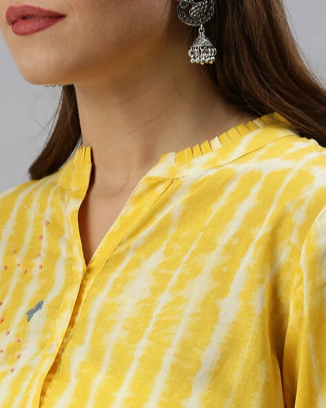 Earrings on yellow deals kurti