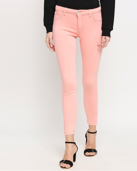 peach skinny jeans