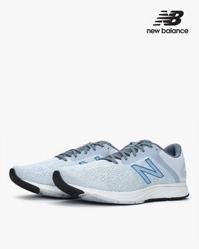 Buy White Sports Shoes for Men by NEW 