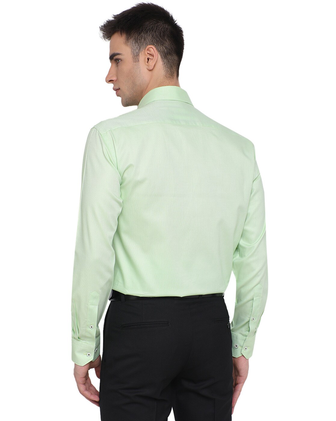 light green shirt and black pants