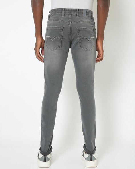 grey mid rise skinny jeans