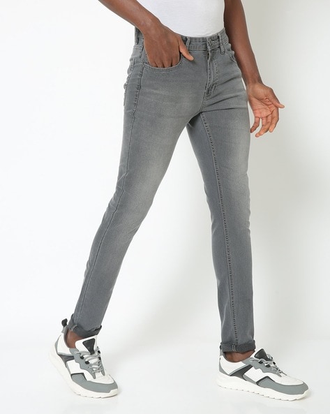 grey mid rise skinny jeans