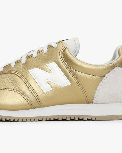 New balance 100 women 2024 gold