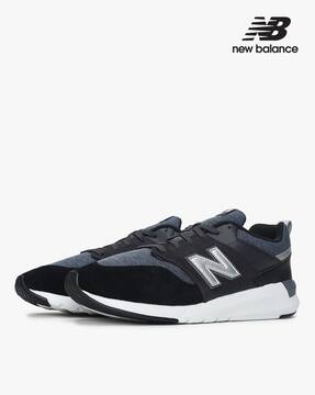 Buy Black Sneakers for Men by NEW 